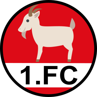 Tippfoot-Teamabzeichen 1. FC mit Ziegen-Symbol